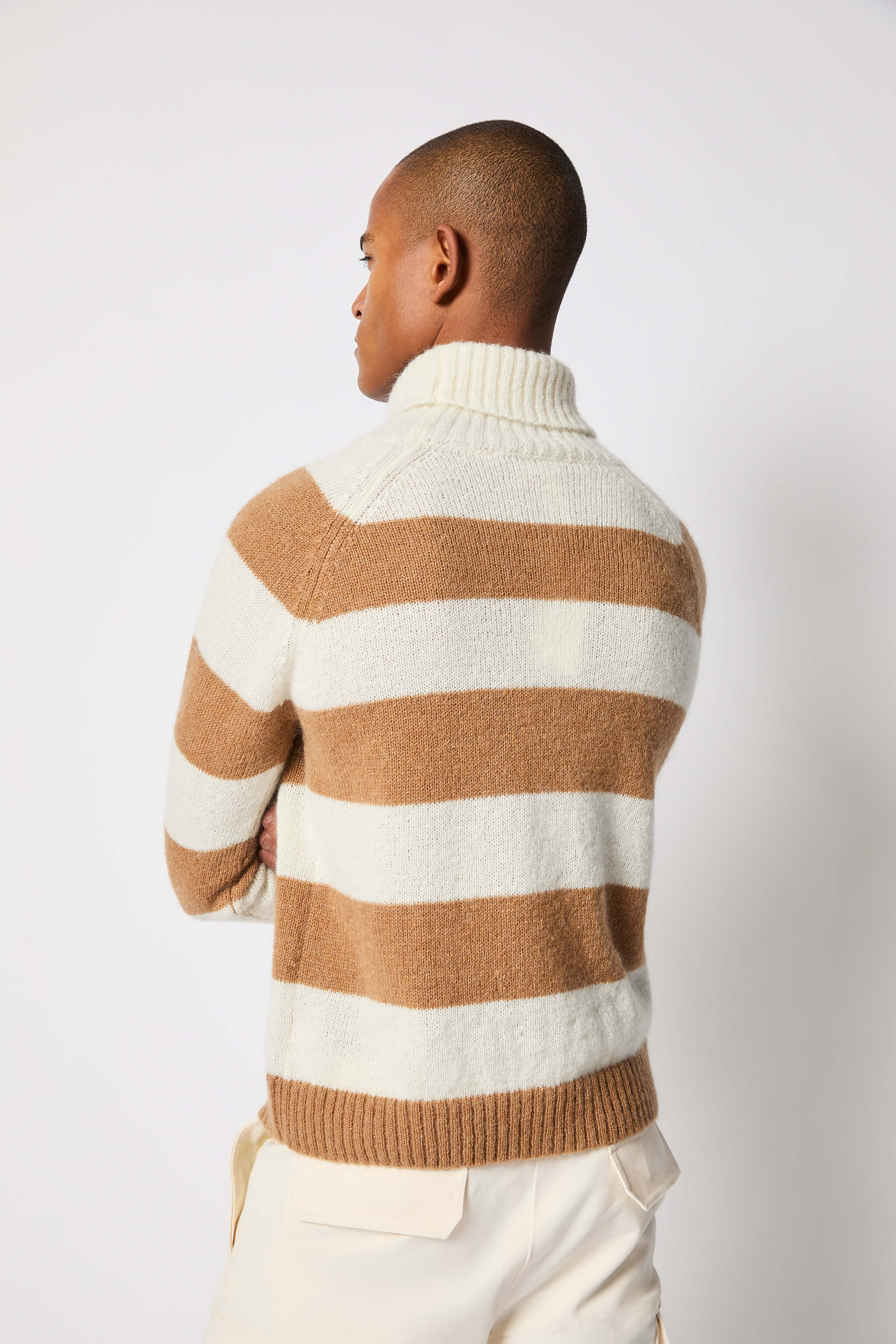 Striped turtleneck in white and camel