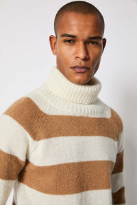 Striped turtleneck in white and camel earth
