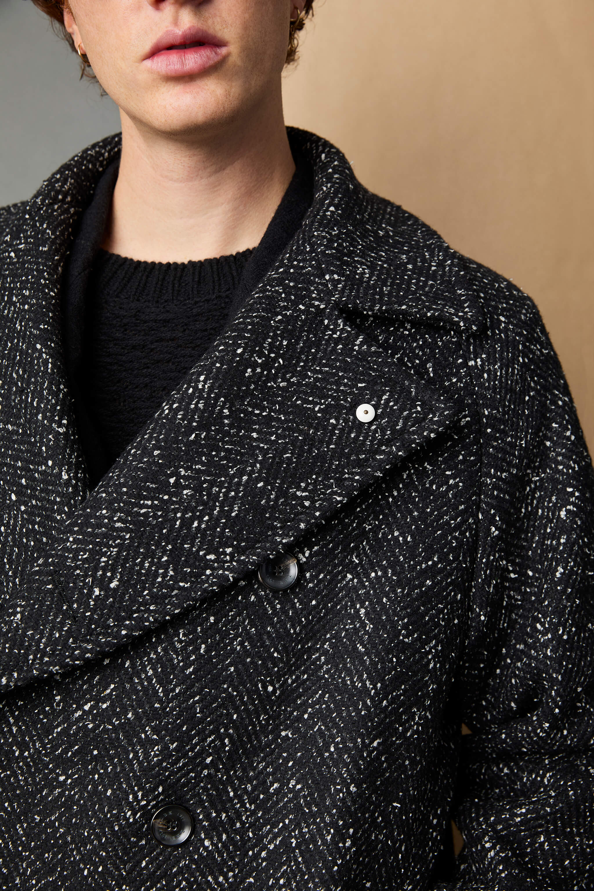 Double-breasted coat in black