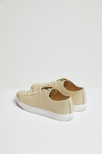 Perforated leather sneaker in beige beige