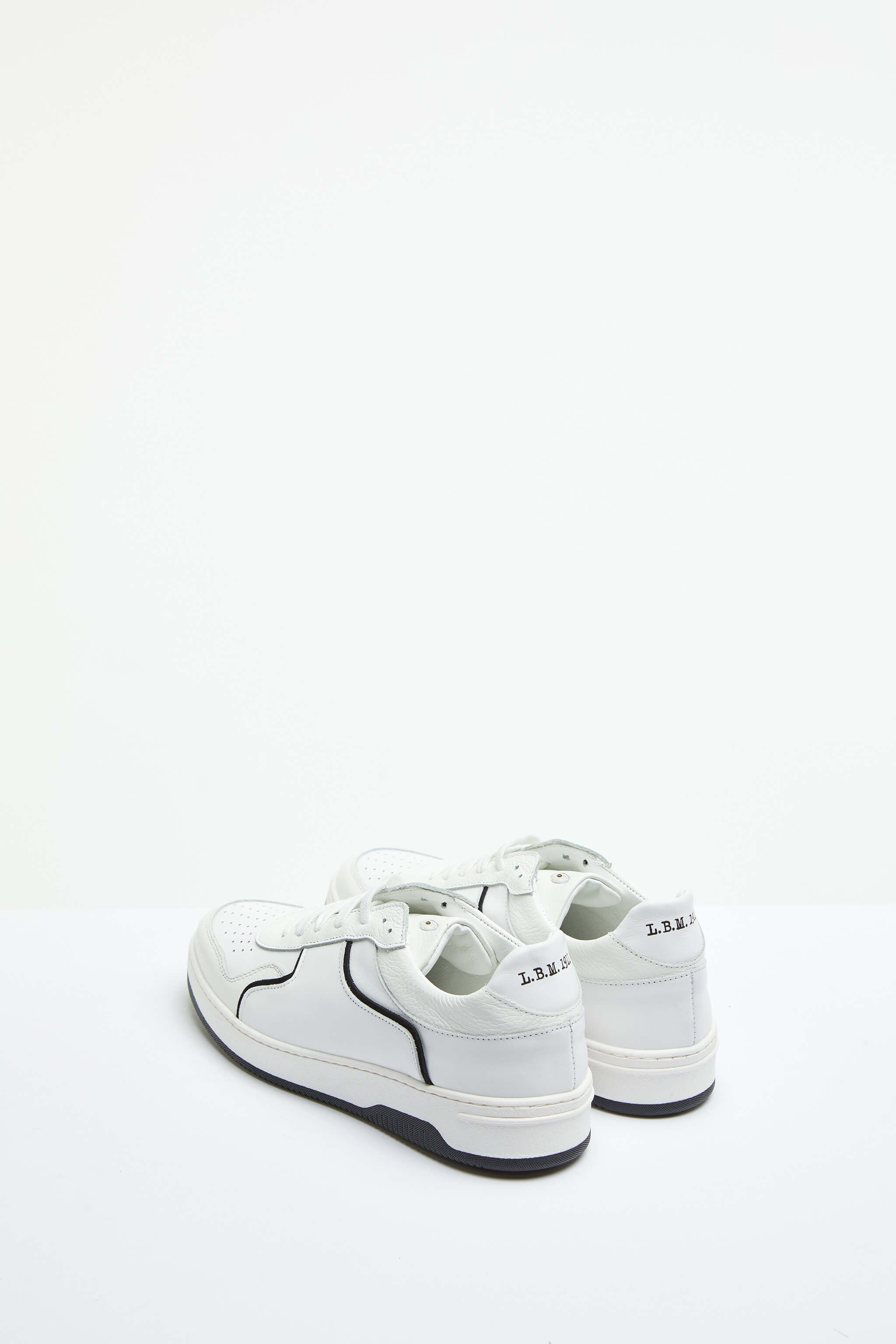 White basketball sneaker with contrast details