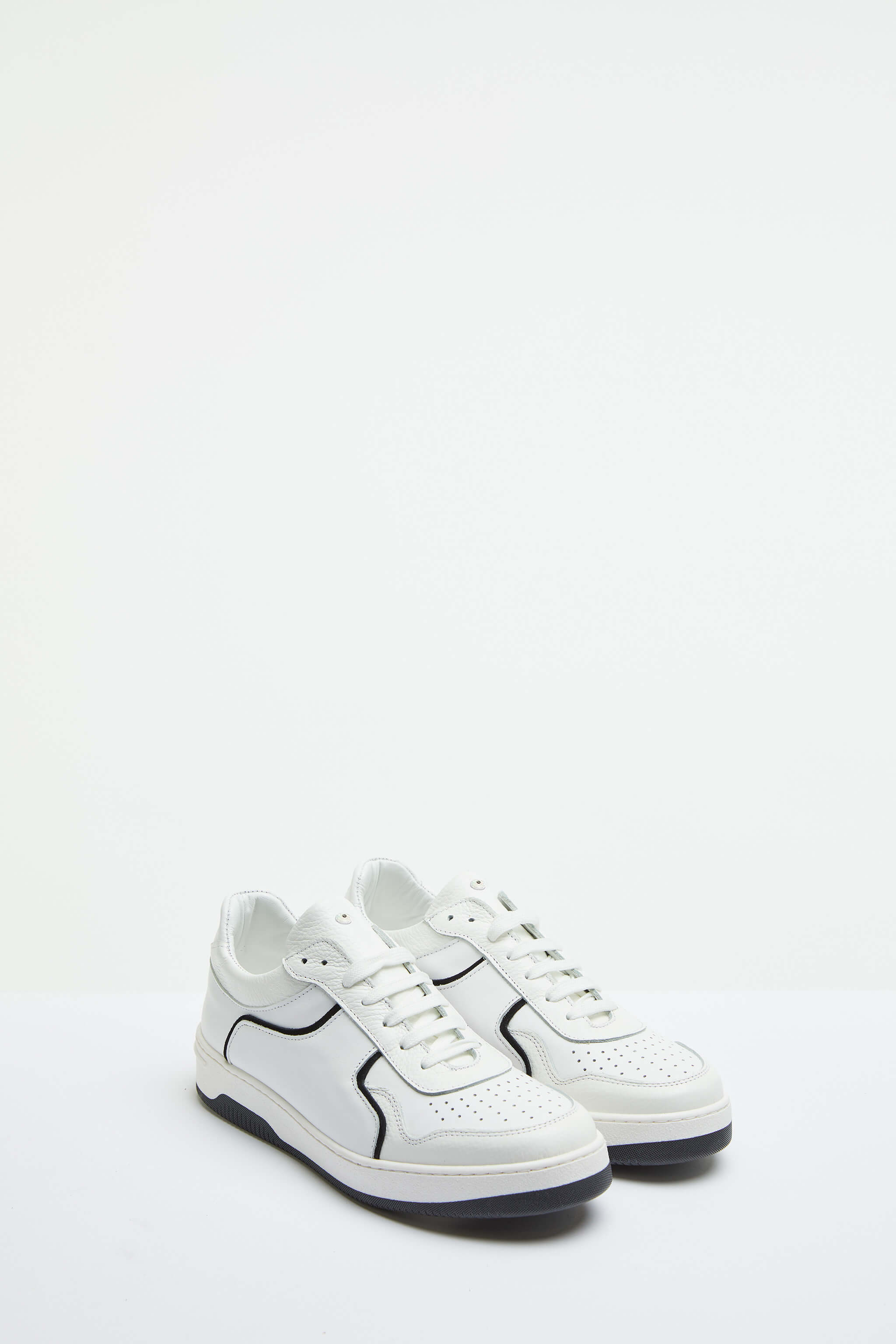 White basketball sneaker with contrast details