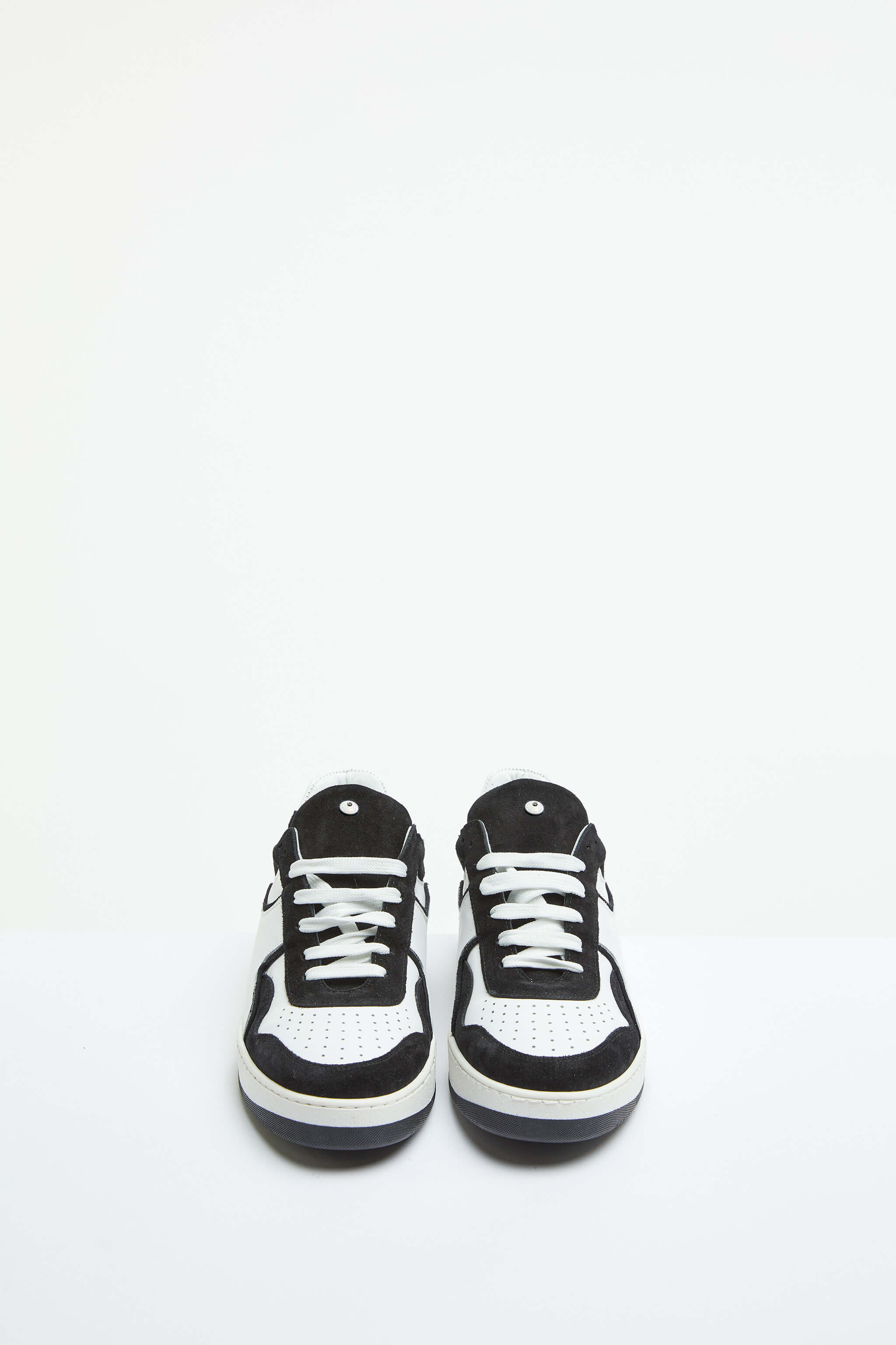 White basketball sneaker with contrast details