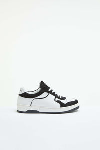 White basketball sneaker with contrast details black