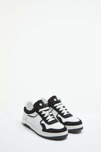 White basketball sneaker with contrast details black