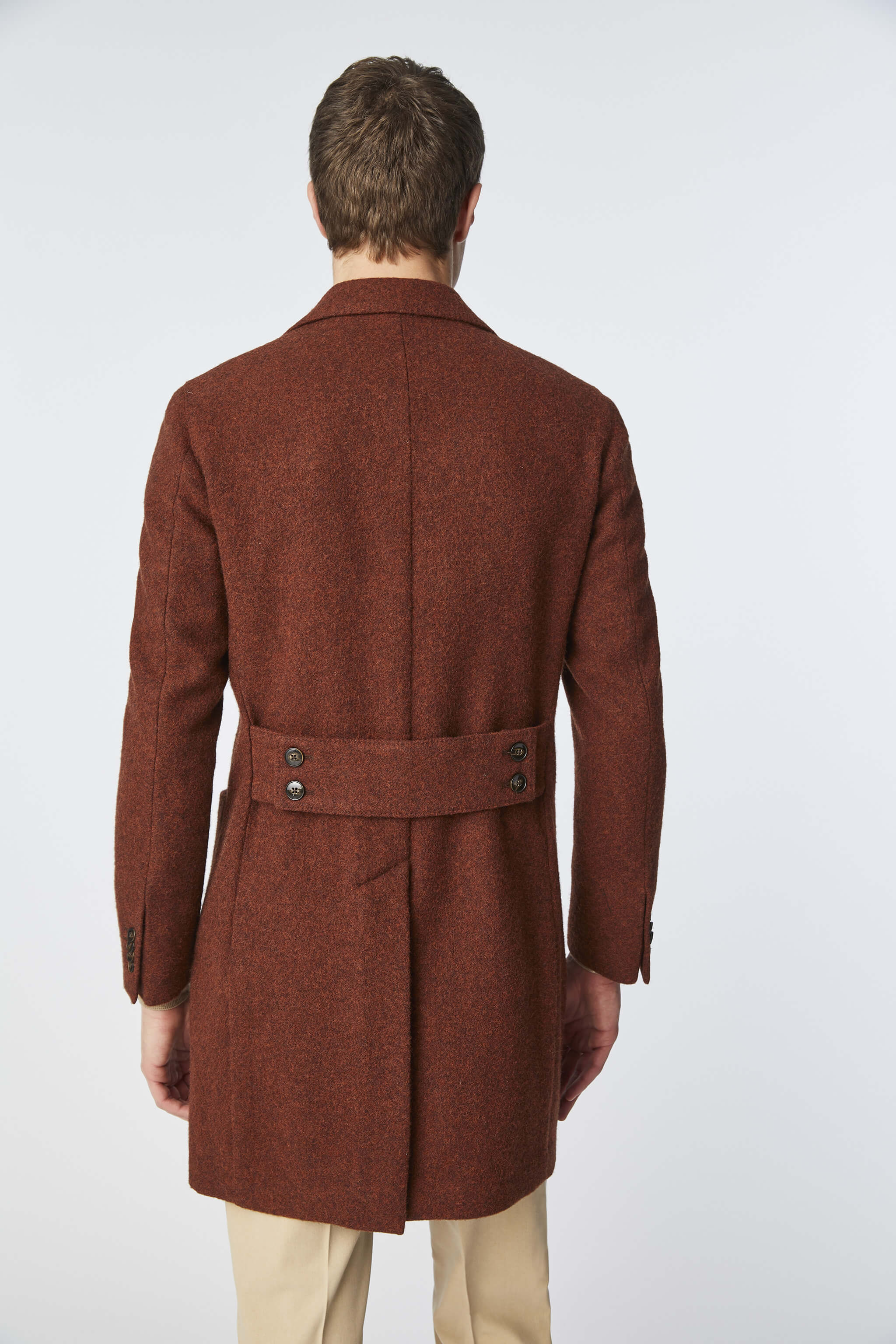 Double-breasted coat in burnt brown