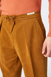 Garment-dyed lester pants in yellow ochre brick