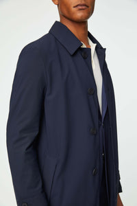 Blue trench coat in technical jersey blue