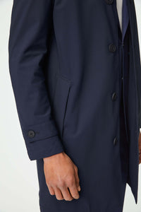 Blue trench coat in technical jersey blue